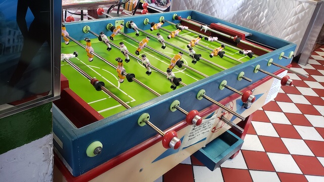 Two foosball tables at Taco Samich